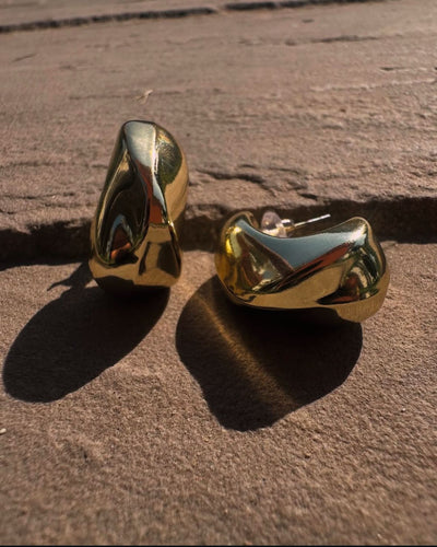 Luxe Gleam: Sculpted Gold Twist Hoops